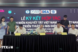 Cérémonie de signature de l’accord à Hanoi, le 10 juillet. Photo : VNA