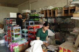 Un ménage commercial à Cân Tho, dans delta du Mékong. Photo : VNA