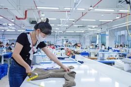 Activités de production chez Destination Garment Company Limited. Photo: VNA