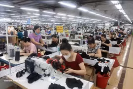 La compagnie de confection TNG Thai Nguyên génère un chiffre d’affaires annuel de plusieurs billions de dôngs et emploie plus de 20.000 personnes. Photo : VNA