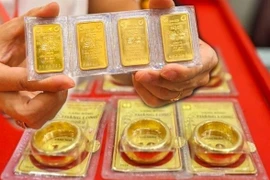 En fonction des objectifs de la politique monétaire, de l'offre et de la demande d'or, des réserves nationales de change et des performances commerciales réelles, la SBV déterminera un quota d'importation annuel total pour le pays (si cela est jugé nécessaire). Photo: VNA