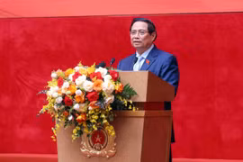 Le Premier ministre Pham Minh Chinh s’adresse à la conférence, à Hanoi, le 12 novembre. Photo : VNA