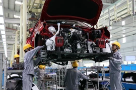 La Resolution N°68 du Poliburo du Parti vise à créer un environnement propice au développement du secteur privé. Photo : VNA