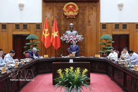 Le Premier ministre Pham Minh Chinh préside la réunion de la permanence du gouvernement sur la préparation de la mise en œuvre du projet de réserve nationale de pétrole brut à Nghi Son. Photo : VNA