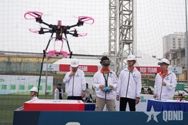 Le concours UAV Cup PV GAS 2025 met aux prises 28 équipes d’élite issues d’universités et d’académies de tout le pays, à Hanoi, le 3 décembre 2025. Photo: QDND