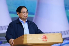 Le Premier ministre Pham Minh Chinh, chef du Comité de pilotage pour la construction de la centrale nucléaire, préside la troisième réunion du Comité, à Hanoi, le 22 octobre. Photo: VNA