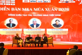 Des experts participant au Forum de printemps sur les fusions-acquisitions 2026. Photos: baophapluat.vn