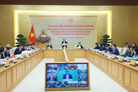 Vue d'ensemble de la conférence nationale, à Hanoi, le 30 décembre. Photo: VNA