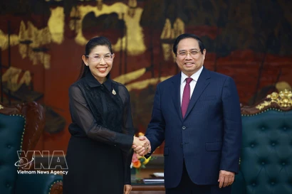 Le Premier ministre Pham Minh Chinh et Urawadee Sriphiromaya, ambassadrice de Thaïlande au Vietnam. Photo: VNA