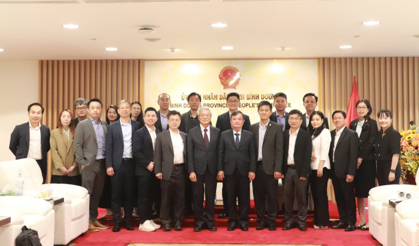 Des autorités de la province de Binh Duong et la dégélation du groupe taïwanais MiTAC. Photo: VNA