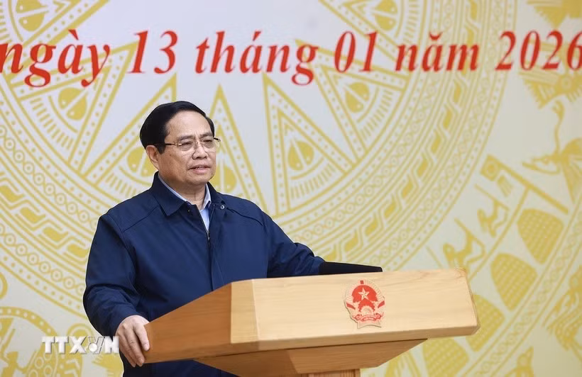 Le Premier ministre Pham Minh Chinh préside la 5e réunion de travail du Comité central de pilotage sur les politiques de logement et le marché immobilier. Photo: VNA
