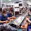 Les exportations de textile-habillement ont atteint 1,84 milliard de dollars, tandis que celles de chaussures se sont élevées à 975 millions de dollars. Photo: VNA