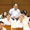 Le ministre de l’Agriculture et de l’Environnement Trinh Viet Hung répond à plusieurs préoccupations sur le développement des biotechnologies et le financement des infrastructures d’adaptation au changement climatique. Photo: VNA