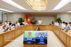 La troisième réunion du Conseil exécutif du Centre financier international au Vietnam. Photo: VNA
