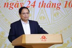 Le Premier ministre Pham Minh Chinh préside une conférence sur l'accélération du développement du logement social. Photo: VNA