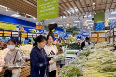 L'indice des prix à la consommation (IPC) du Vietnam a reculé de 0,39 % en juin par rapport au mois précédent. Photo: VNA