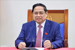 Le Premier ministre vietnamien Pham Minh Chinh s'entretient par téléphone avec Alexeï Likhatchev, directeur général de Rosatom. Photo: VNA
