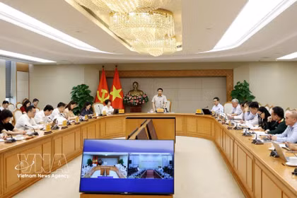 La quatrième réunion du Conseil exécutif du Centre financier international du Vietnam, tenue le 22 octobre à Hanoï. Photo: VNA
