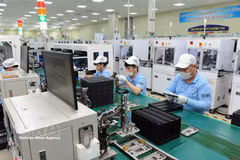 Chaîne de production de la société électronique SAMK WANG, dans le parc industriel de Quang Châu, province de Bac Ninh. Photo: VNA