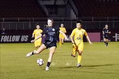 Des joueuses de Hô Chi Minh-Ville (maillot jaune). Photo: VNA