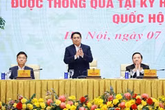 Le Premier ministre Pham Minh Chinh préside une conférence visant à diffuser et à mettre en œuvre les lois et résolutions récemment adoptées par la 15ᵉ Assemblée nationale (AN) lors de sa 9ᵉ session extraordinaire. Photo: VNA