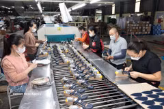Le cuir et la chaussure comptent parmi les principaux secteurs exportateurs du Vietnam. Photo: VNA