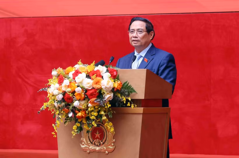 Le Premier ministre Pham Minh Chinh s’adresse à la conférence, à Hanoi, le 12 novembre. Photo : VNA