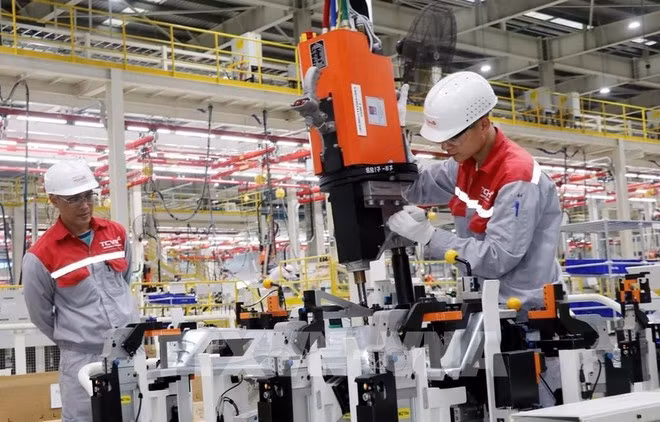 Une chaîne de production de l'usine automobile Thành Công Viêt Hung. Photo : VNA
