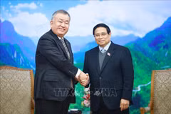 Le Premier ministre Pham Minh Chinh (droite) et le directeur général et président du Yamato Holdings, Nagao Yutaka. Photo : VNA