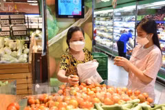 L'IPC vietnamien progresse de 1,14 % en février sous l'effet de la demande liée au Têt. Photo : VNA