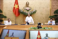 PM Nguyen Xuan Phuc: La situation socio-économique s'améliore de plus en plus