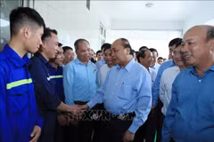 Le PM rencontre des travailleurs de la mine de charbon de Ha Lam