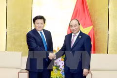 Le Premier ministre Nguyen Xuan Phuc reçoit des responsables de grands groupes de l'APEC