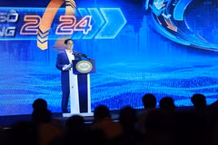 Le Premier ministre Pham Minh Chinh s’exprime lors de la conférence à Hanoi, le 8 mai. Photo : VNA