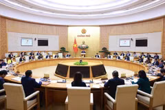 Le Premier ministre Pham Minh Chinh préside la réunion mensuelle régulière du gouvernement, le 7 décembre. Photo : VNA