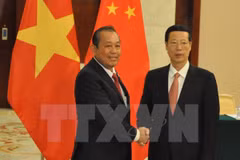  Vietnam-Chine: le vice-PM permanent Truong Hoà Binh rencontre le vice-PM Zhang Gaoli