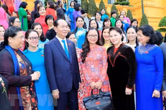 Le président Tran Dai Quang rencontre les députées de la 14e législature de l’AN