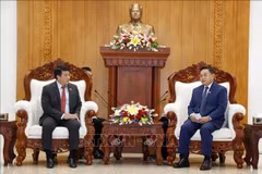 Les dirigeants lao apprécient la coopération entre des agences des AN du Vietnam et du Laos