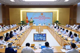 Le Premier ministre Le Minh Hung préside une conférence consacrée à la mise en œuvre du programme cible national de développement socio-économique des zones de minorités ethniques et montagneuses pour la période 2026-2035. Photo: VNA