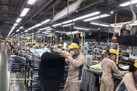 Activités de production de Toyota Boshoku Hanoi. Photo: VNA
