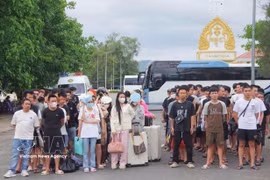 An Giang reçoit 109 citoyens vietnamiens remis par le Cambodge. Photo: VNA