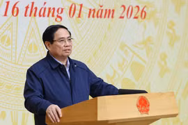 Le Premier ministre Pham Minh Chinh s'exprime lors de la conférence. Photo: VNA