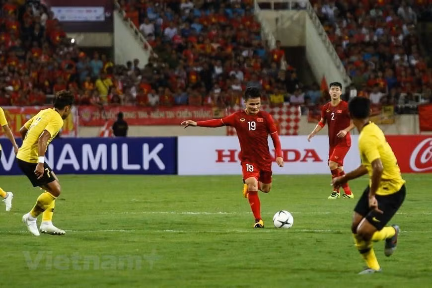 Nguyên Quang Hai, héros du match. Photo: VNA 