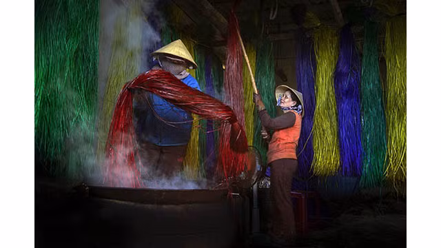 L'œuvre « Le métier de tissage des nattes ».