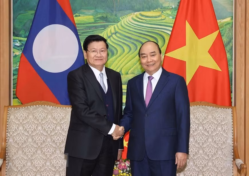 La 43e réunion du Comité intergouvernemental pour la coopération bilatérale Vietnam-Laos a eu lieu le 6 décembre à Hanoï, sous la co-présidence du Premier ministre Nguyen Xuan Phuc et de son homologue lao Thongloun Sisoulith. Photo: VNA