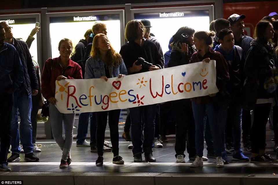 Bienvenue aux réfugiés en Allemagne. 
