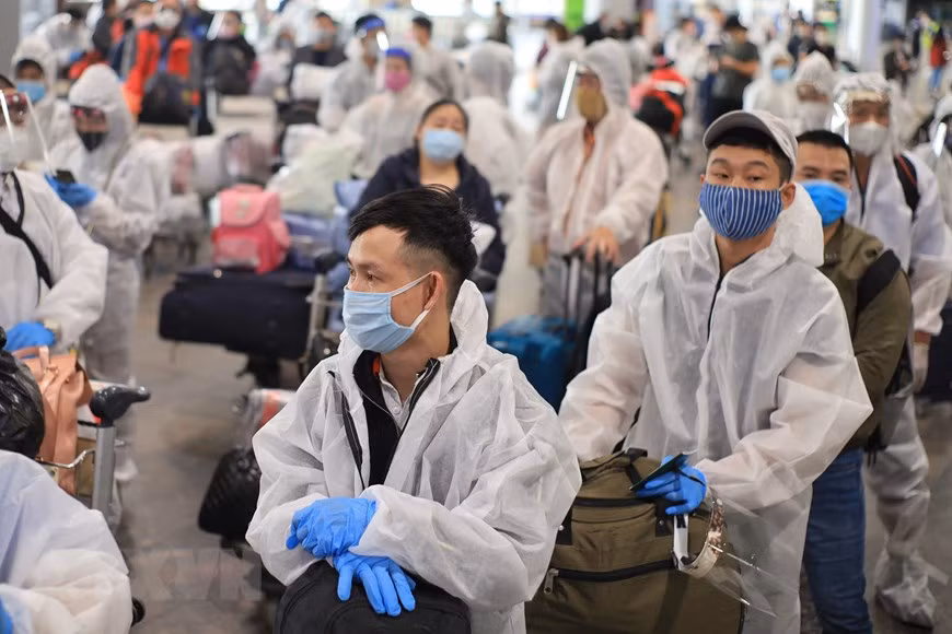 Citoyens vietnamiens à l’aéroport de Sheremetyevo. 