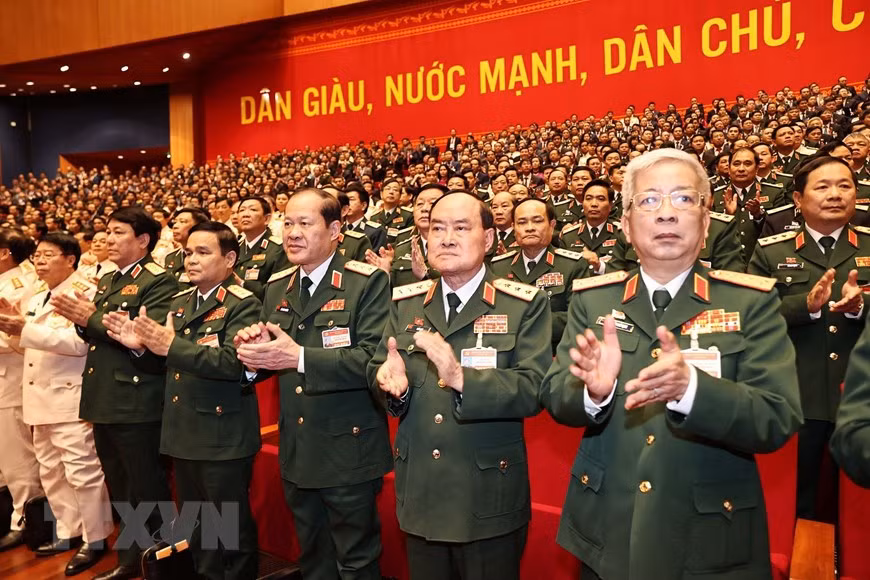  Des délégués de l’organisation du Parti de l’Armée populaire du Vietnam. Photo : VNA 