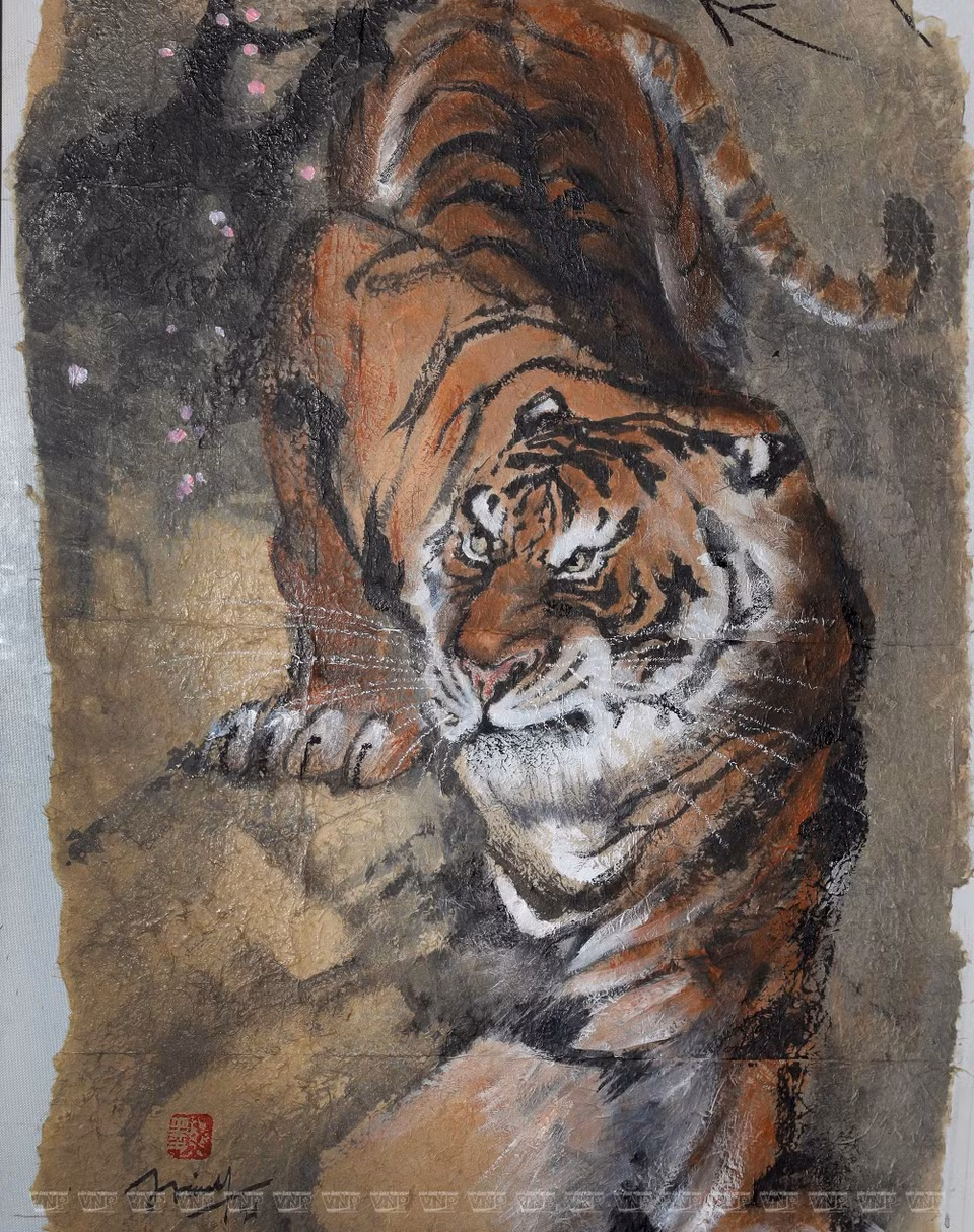 L'adresse, la méticulosité ainsi que la créativité artistique du peintre se manifestent de manière cohérente dans ses œuvres et les expressions sur le visage de chaque tigre semblent toucher le fort intérieur de l'homme . Photo: VNP