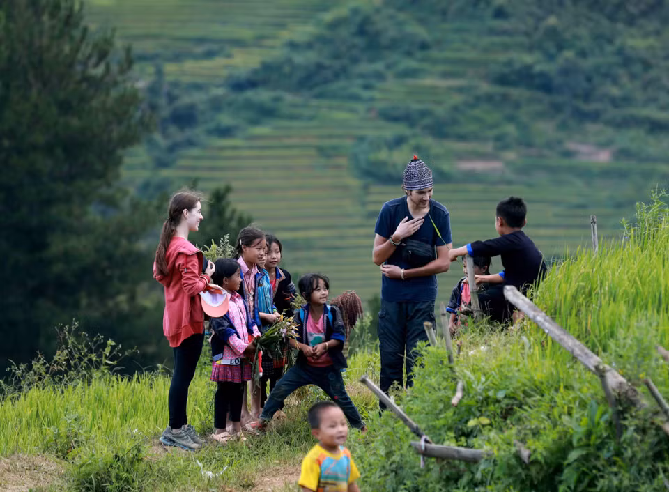  Les rizières sont des destinations touristiques attrayantes, séduisant tant les Vietnamiens que les étrangers. Photo : VNA 